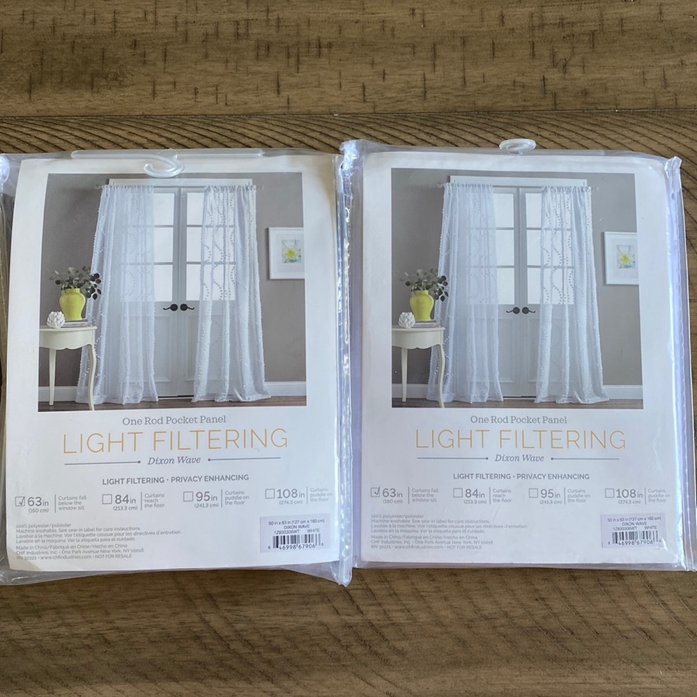Set of light filtering white curtains